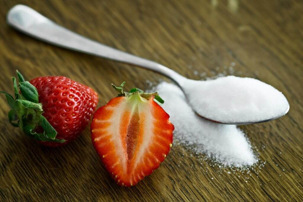 Sucrose is found in table sugar, and all three types of sugar is found in strawberries.