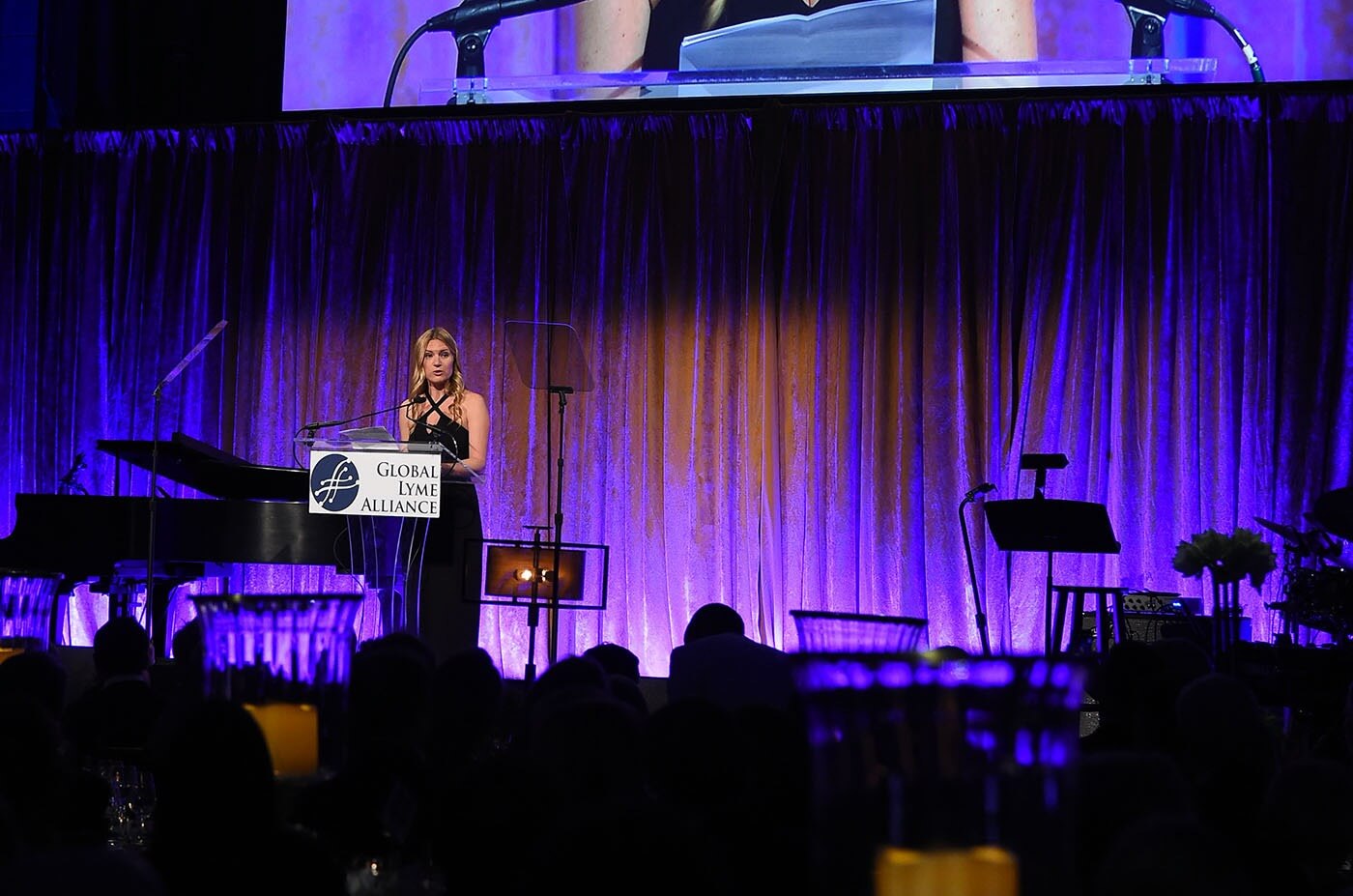 Adrienne Nolan-Smith, patient advocate, wellness speaker, wellness expert and the founder of WellBe speaking at the Global Lyme Alliance gala in New York City.